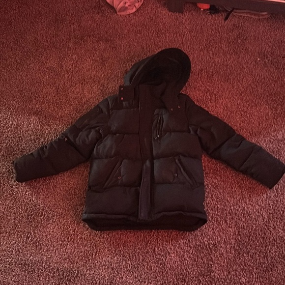 Selling a black moose knuckles